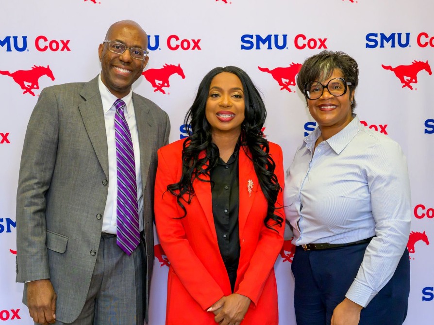 Louis Hill Jr. with colleague at SMU event
