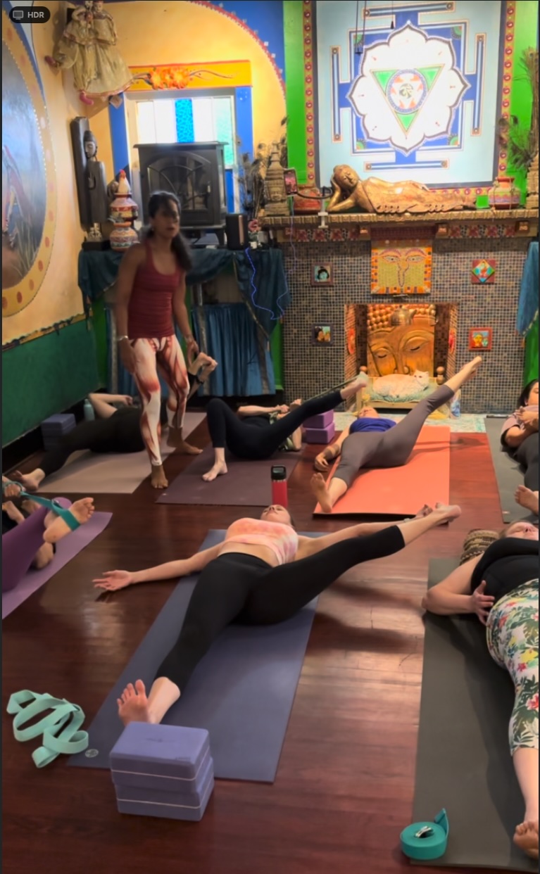 Louis Hill Jr. yoga class at Cosmic Cafe